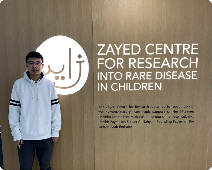 Student next to Zayed Centre for research into rare disease in children